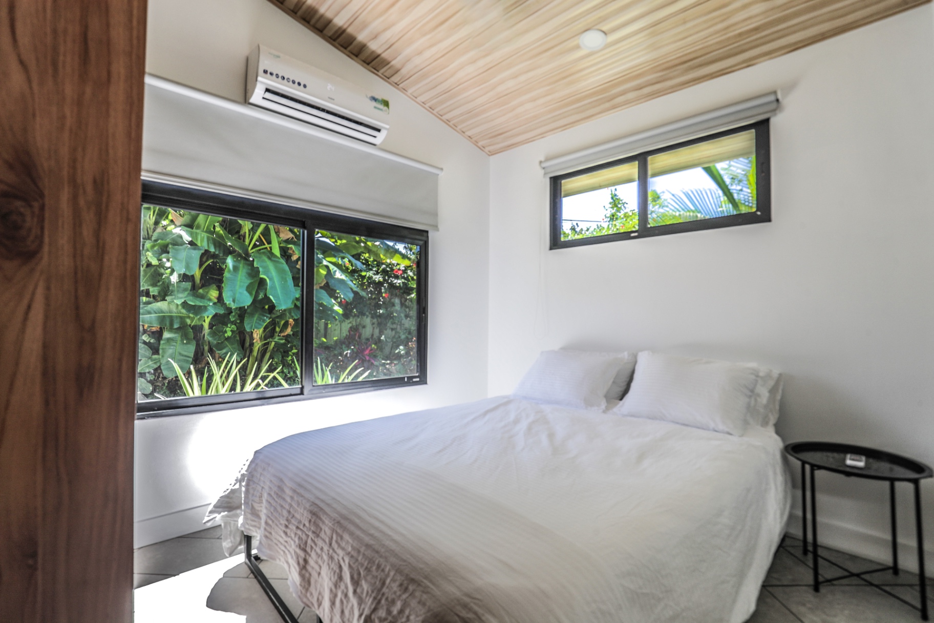 Queen bedroom with tropical garden view and air conditioning in Unit 1 at The Retreat Uvita